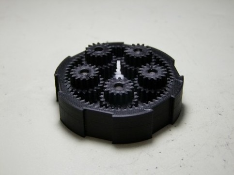 The 3D printed mechanism allows for rapid energy storage and transfer between two coaxial systems.