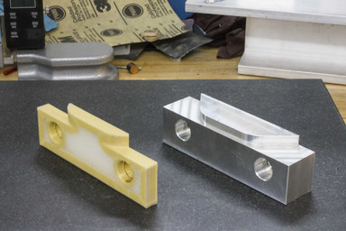 Kevlar Reinforced Soft Jaw next to Aluminum Jaw
