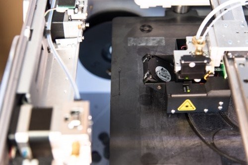 During Adaptive Bed Leveling, the printer prints a small strip on the left side of the bed.