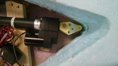 The bracket is holding the linear actuator in place and securing it to the deck.