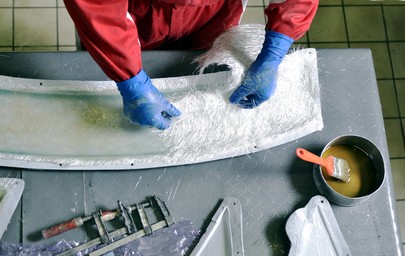 a fiberglass layup within a mold