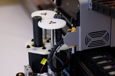 A 3D printed bracket for the cutting head of an Autometrix machine.