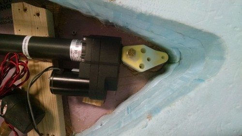 The bracket is holding the linear actuator in place and securing it to the deck.