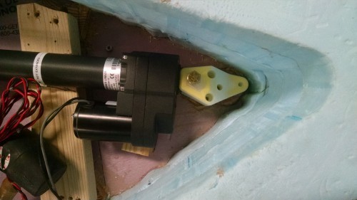 The bracket is holding the linear actuator in place and securing it to the deck.